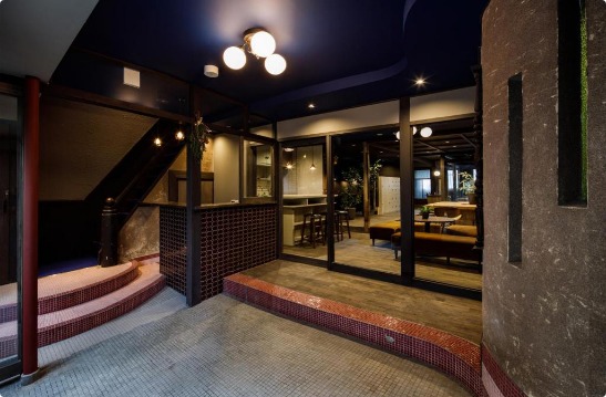 UNKNOWN KYOTO design hostel interior in a converted historic building