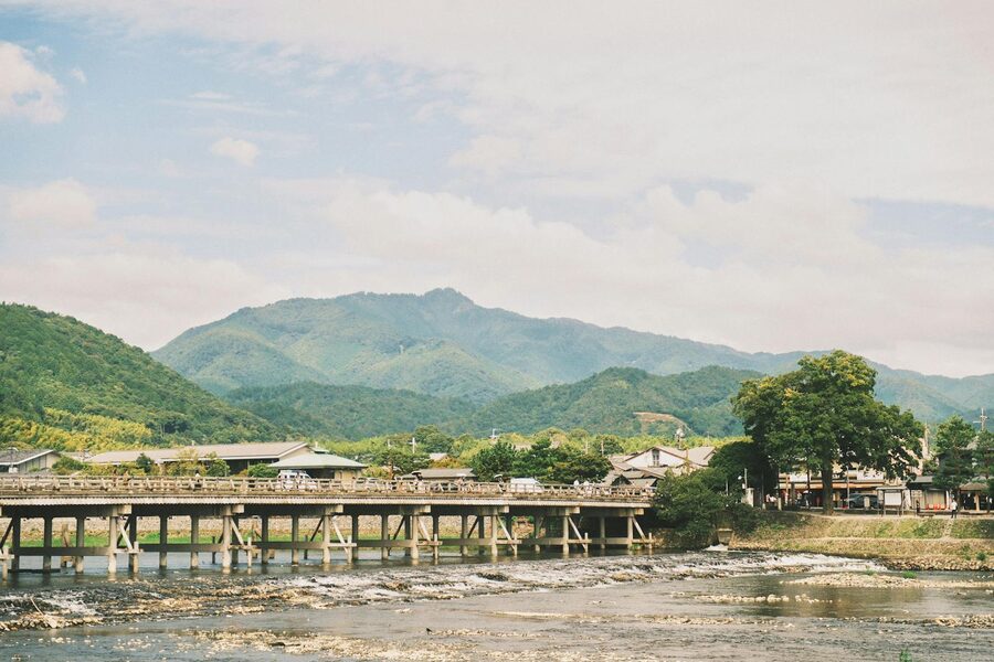 Togetsukyo Bridge spanning the Hozu River with Arashiyama mountains behind