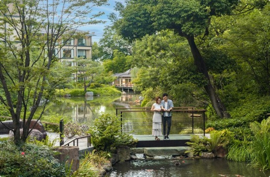 Four Seasons Hotel Kyoto with pond garden and traditional landscape