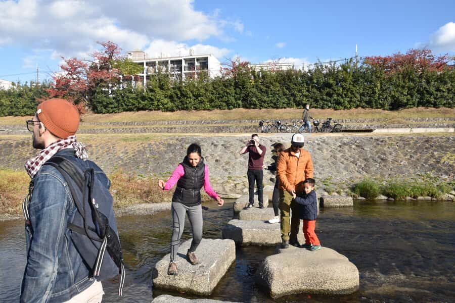 Cycle Kyoto's Hidden Gems & Gion Stroll - River junction and the lighted return: why the timing helps