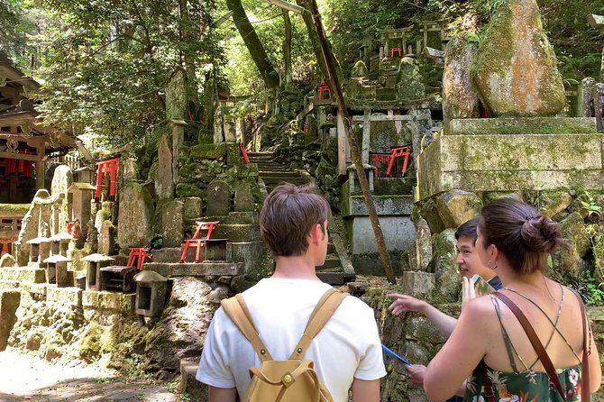 Fushimi Inari Hidden Hiking Tour (Private Option Available) - Taking in the view: Fushimi-Momoyama Castle from above the torii gates