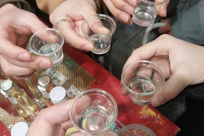 Kyoto Food Tour of 10 Tastings with Wagyu, Mochi & More Surprises - Nishiki Market: where yuba tofu, sake, and fish cakes do the talking