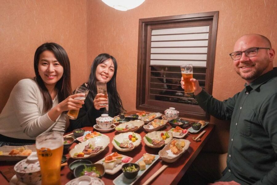 Kyoto: Foodie Night Tour in Gion with 9 dishes + 6 Sake - Gion after dark: old streets, careful pacing, and maybe a geisha sighting