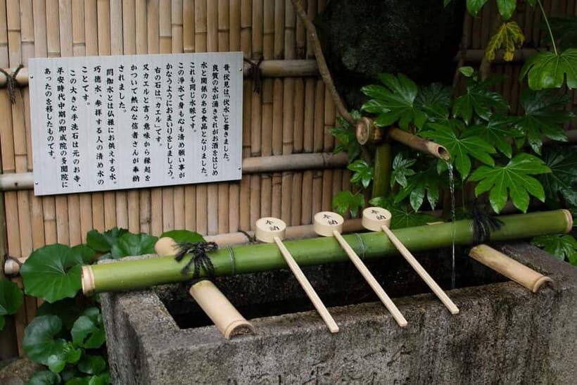 Kyoto: Fushimi Sake District Tour with Boat Ride - Key tour highlights you’ll actually feel