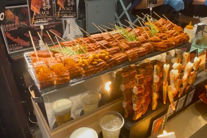Private Nishiki Market Food & Sake Tour by Young Local Guides - Kyoto-made sake tasting: crisp to fruity in real shops